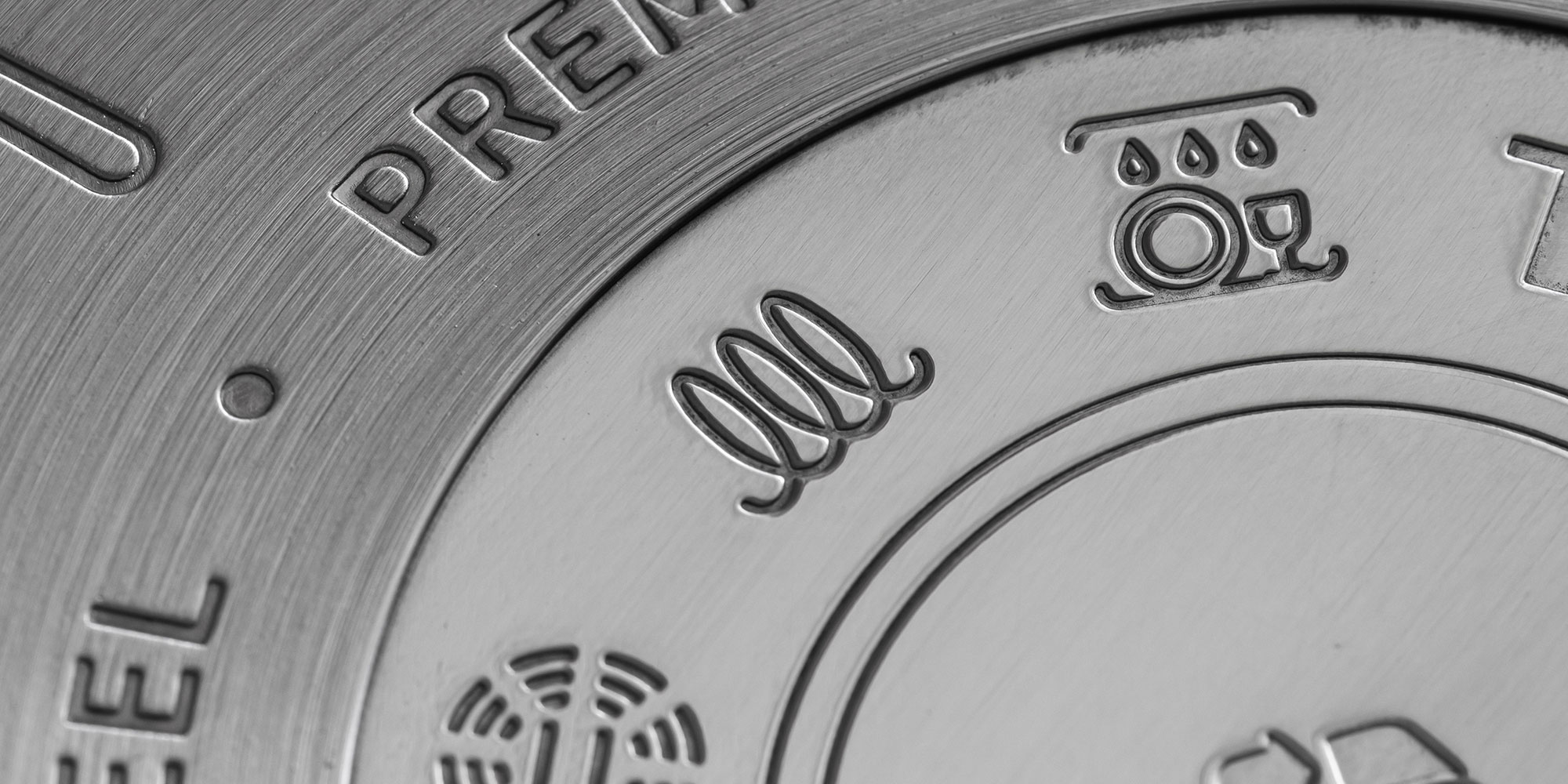 Induction hob compatible image on the bottom of a stainless steel saucepan