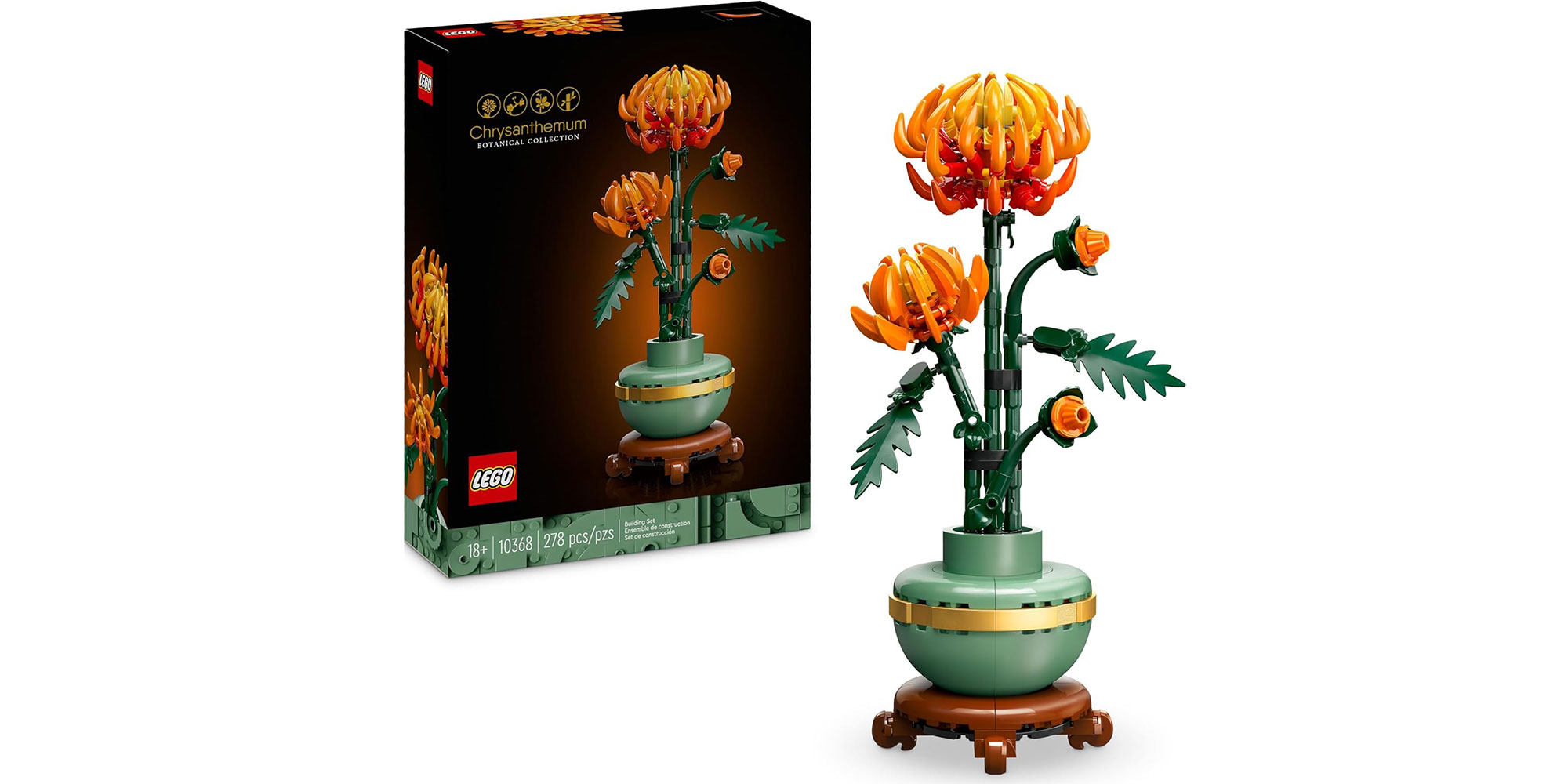 A bright orange Lego Chrysanthemum flower in a jade green pot with a decorative gold band stood on top of a wood-effect Lego plinth, with the box for the Lego set sat behind.
