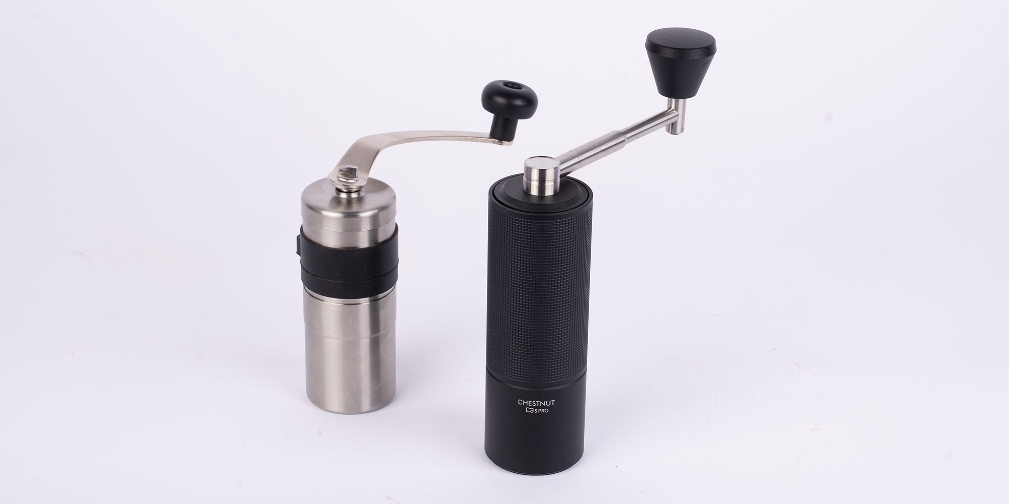 pair of manual coffee grinders 