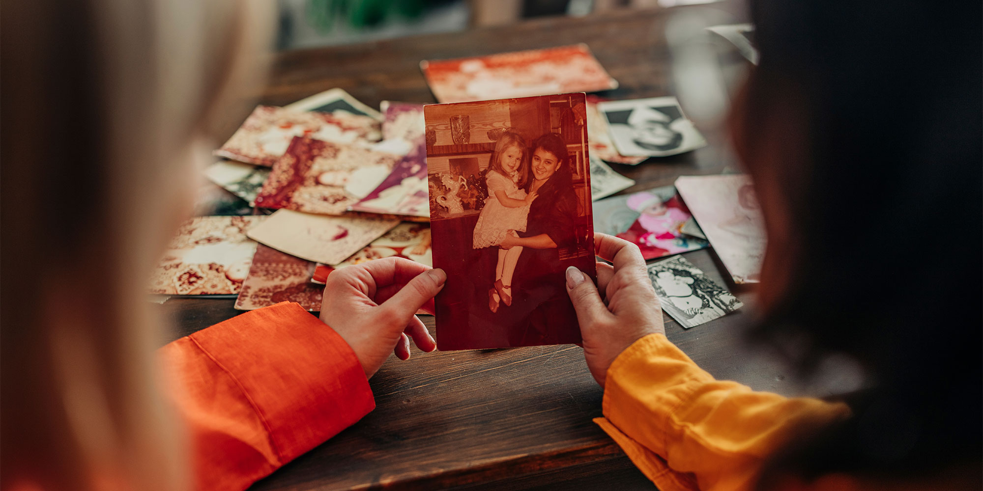 Holding an old family photo