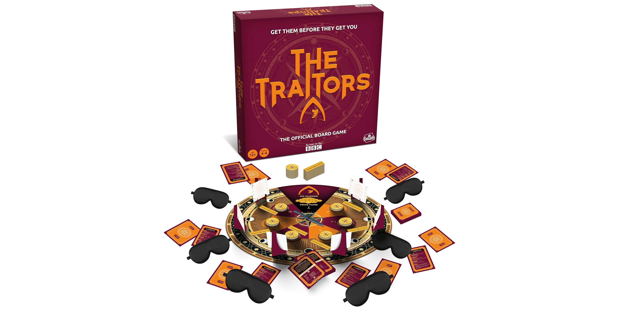 Traitors board game displayed on table including the game board, blindfolds, cards and gold