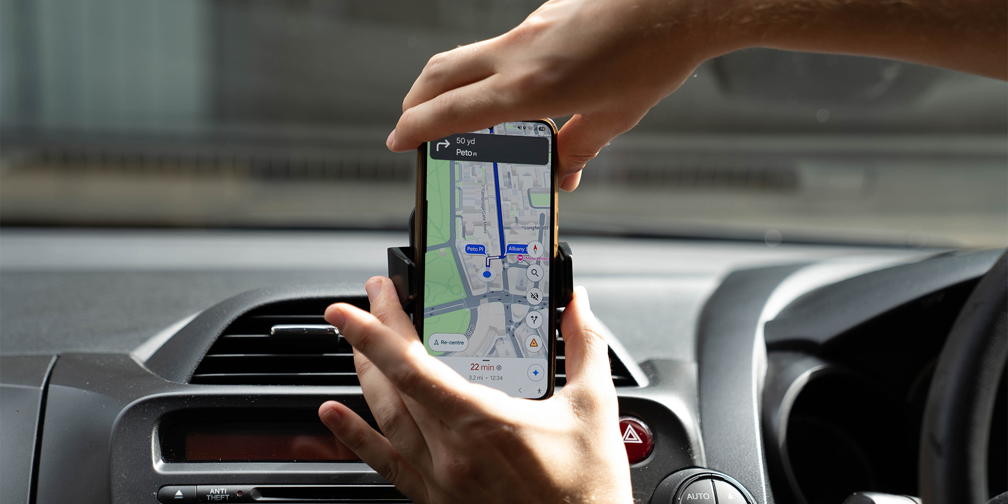 Adjusting a car phone holder