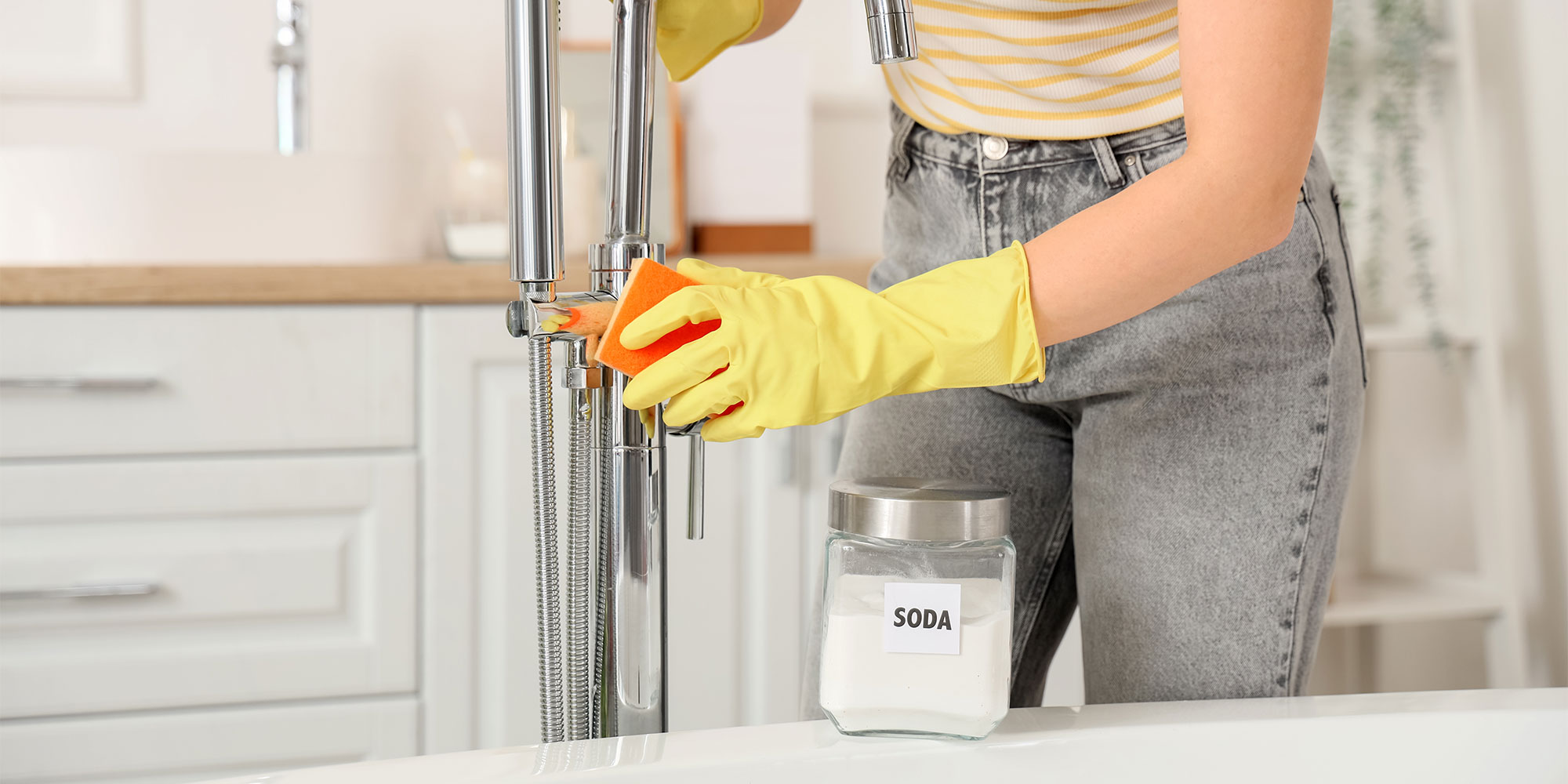 person cleaning a bathroom with bicarbonate of soda