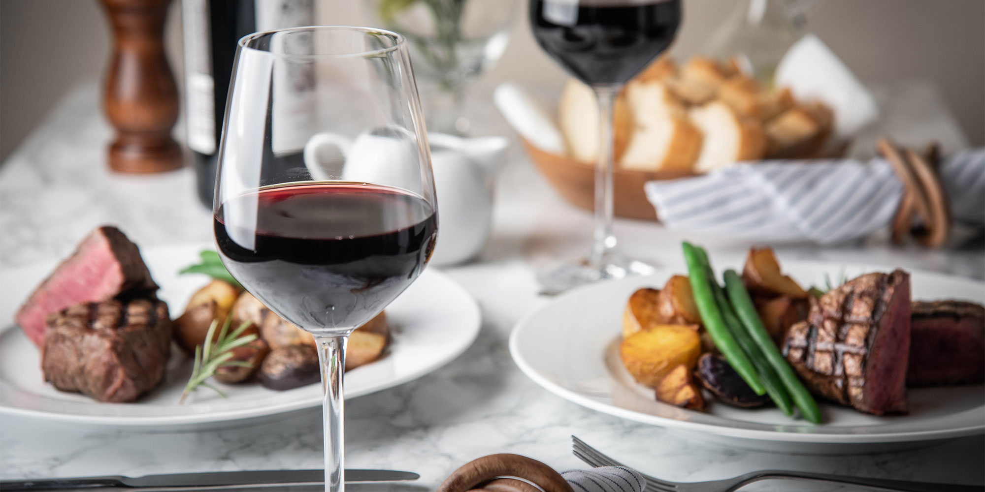 A glass of red wine with dinner