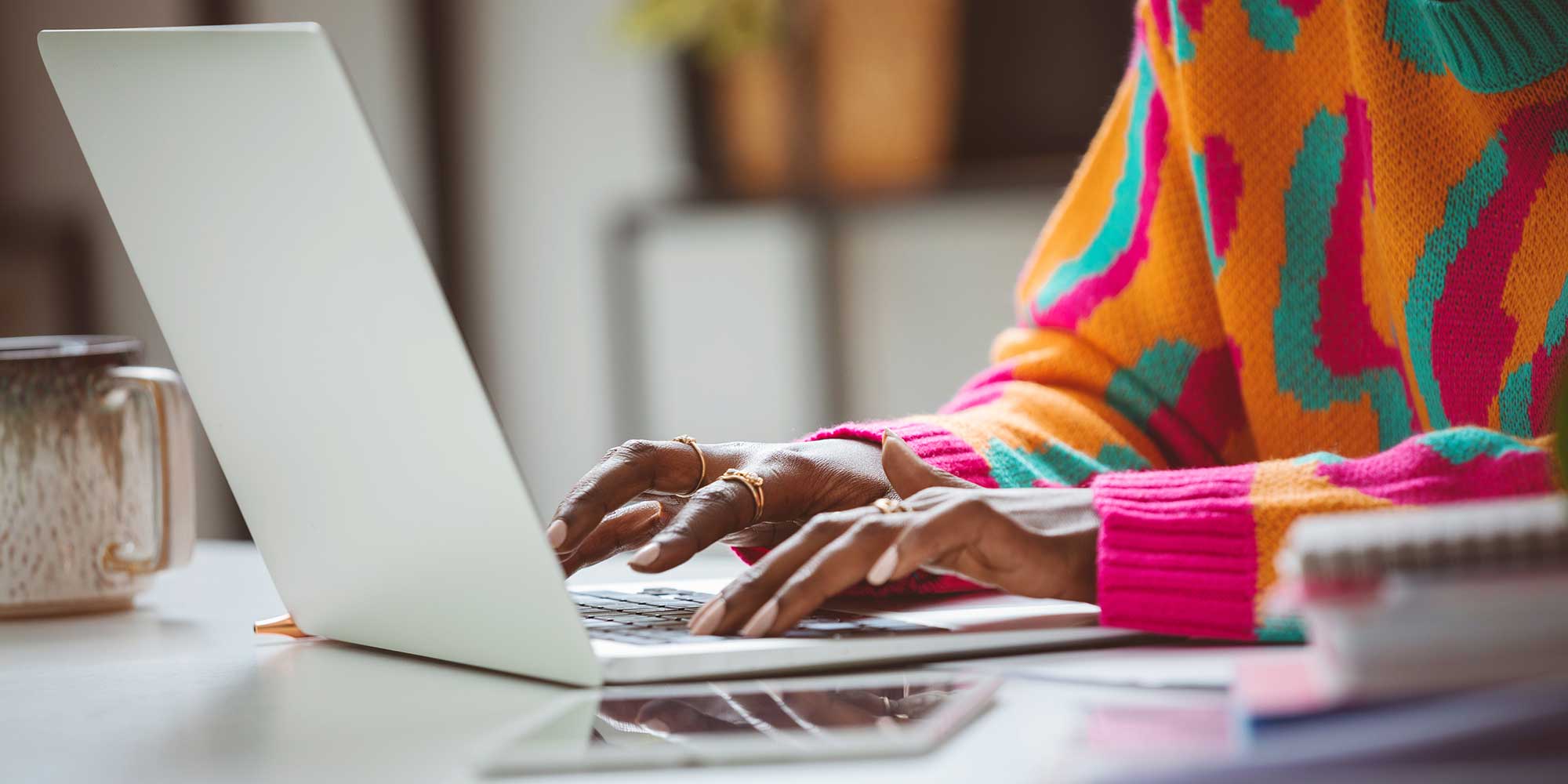 Person typing on a laptop