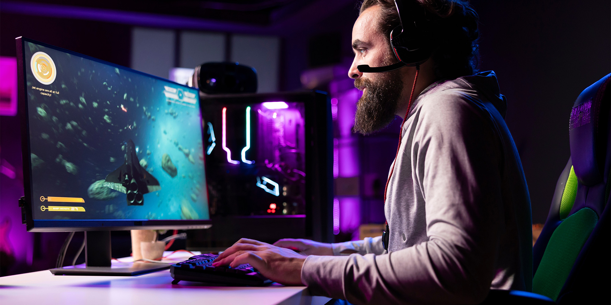 A man gaming at a PC