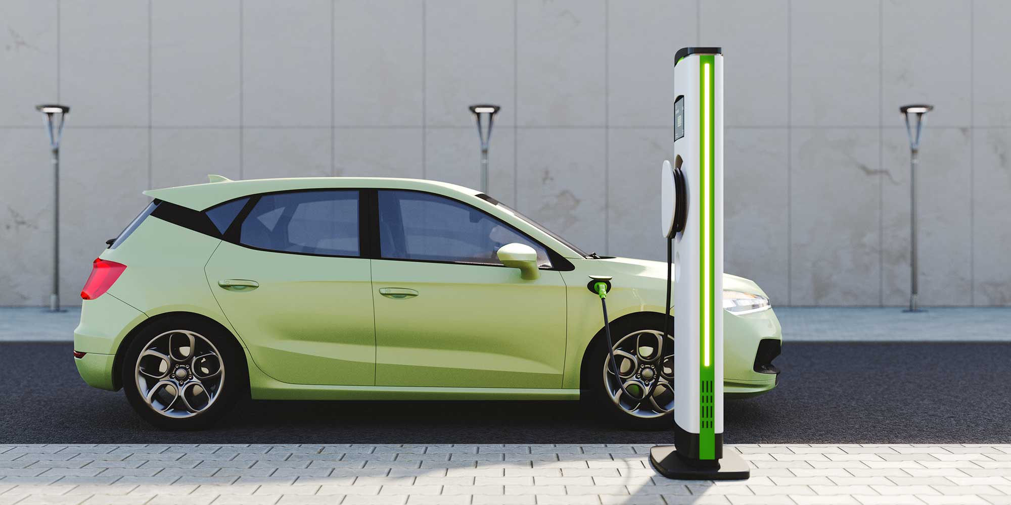 An electric car charges using a street side charger.