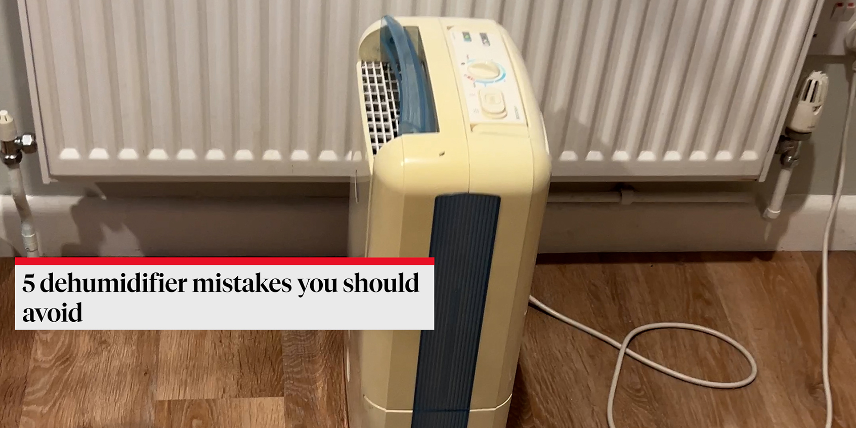 a dehumidifier in a dining room turned on to reduce condensation with a caption to the left