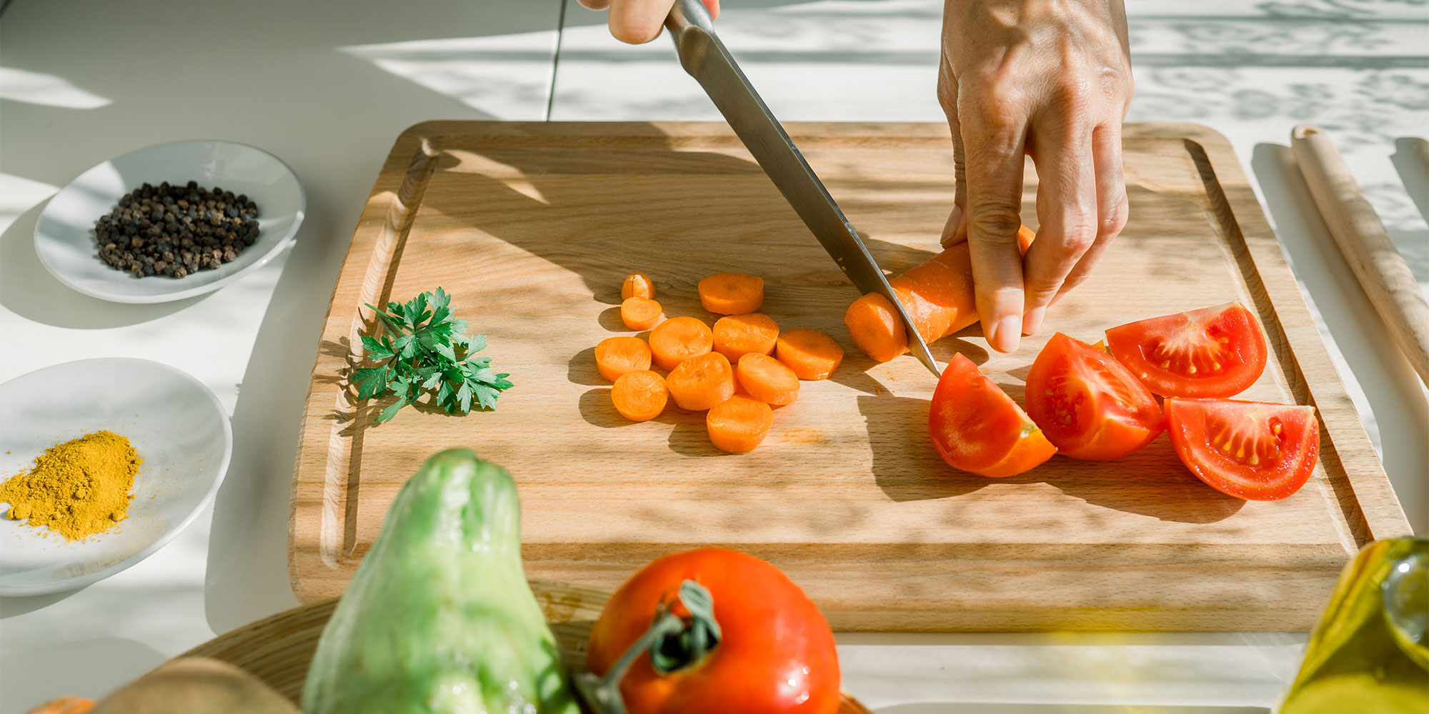 A wooden chopping board with food on it