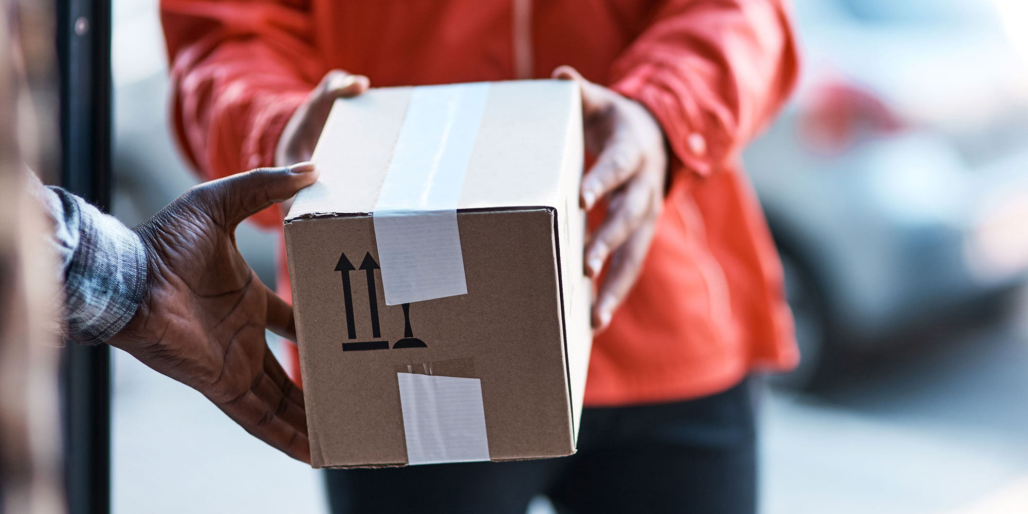 Parcel being handed over at the door