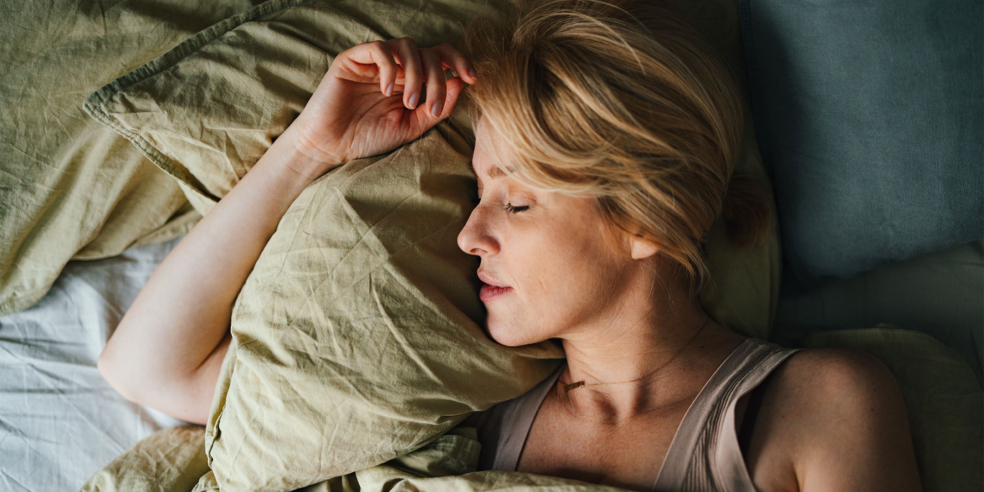 A woman sleeping in bed