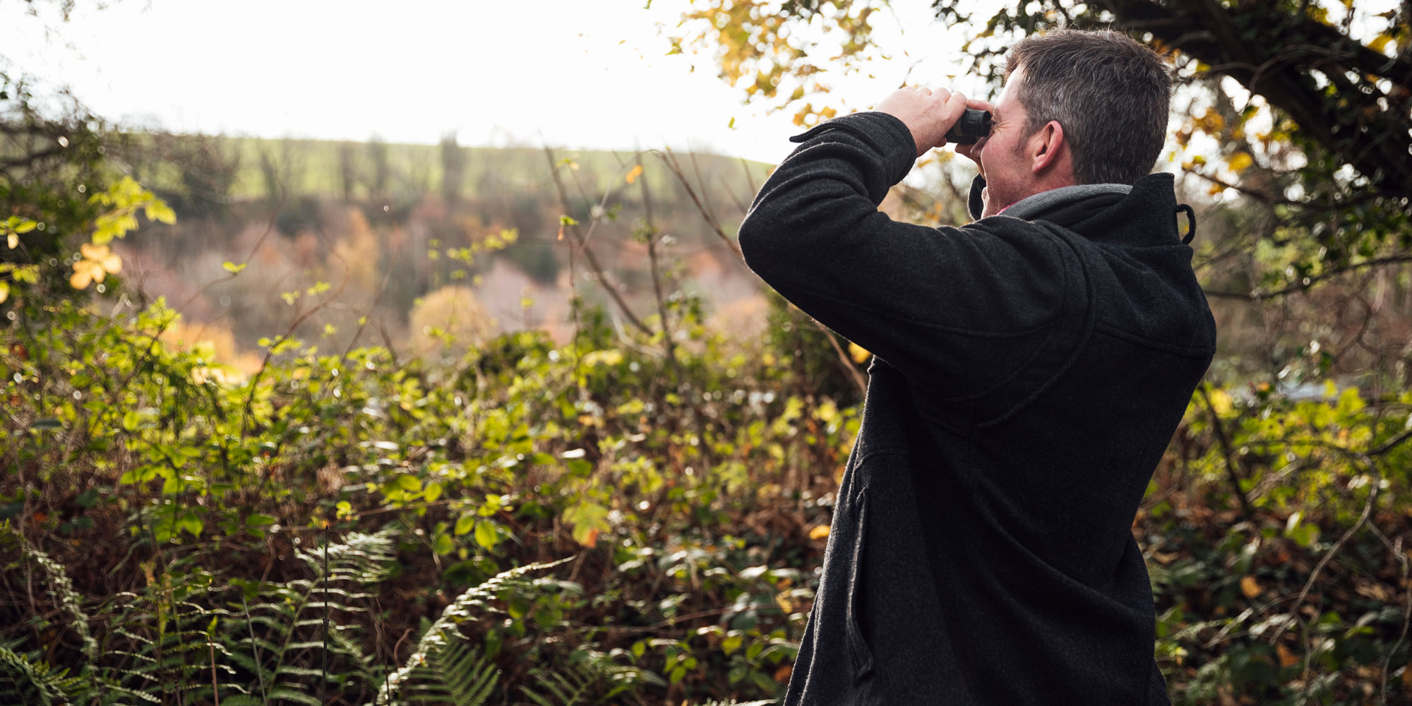 Man with binoculars