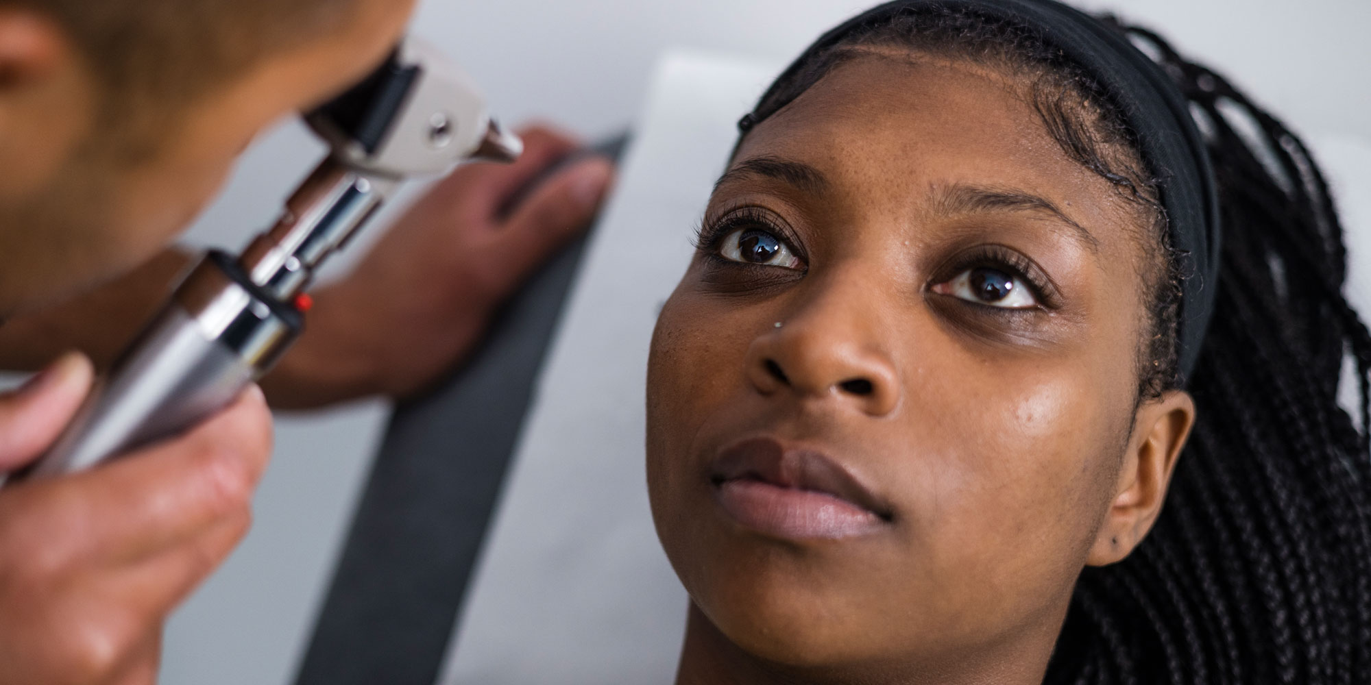 A woman having her eye examined