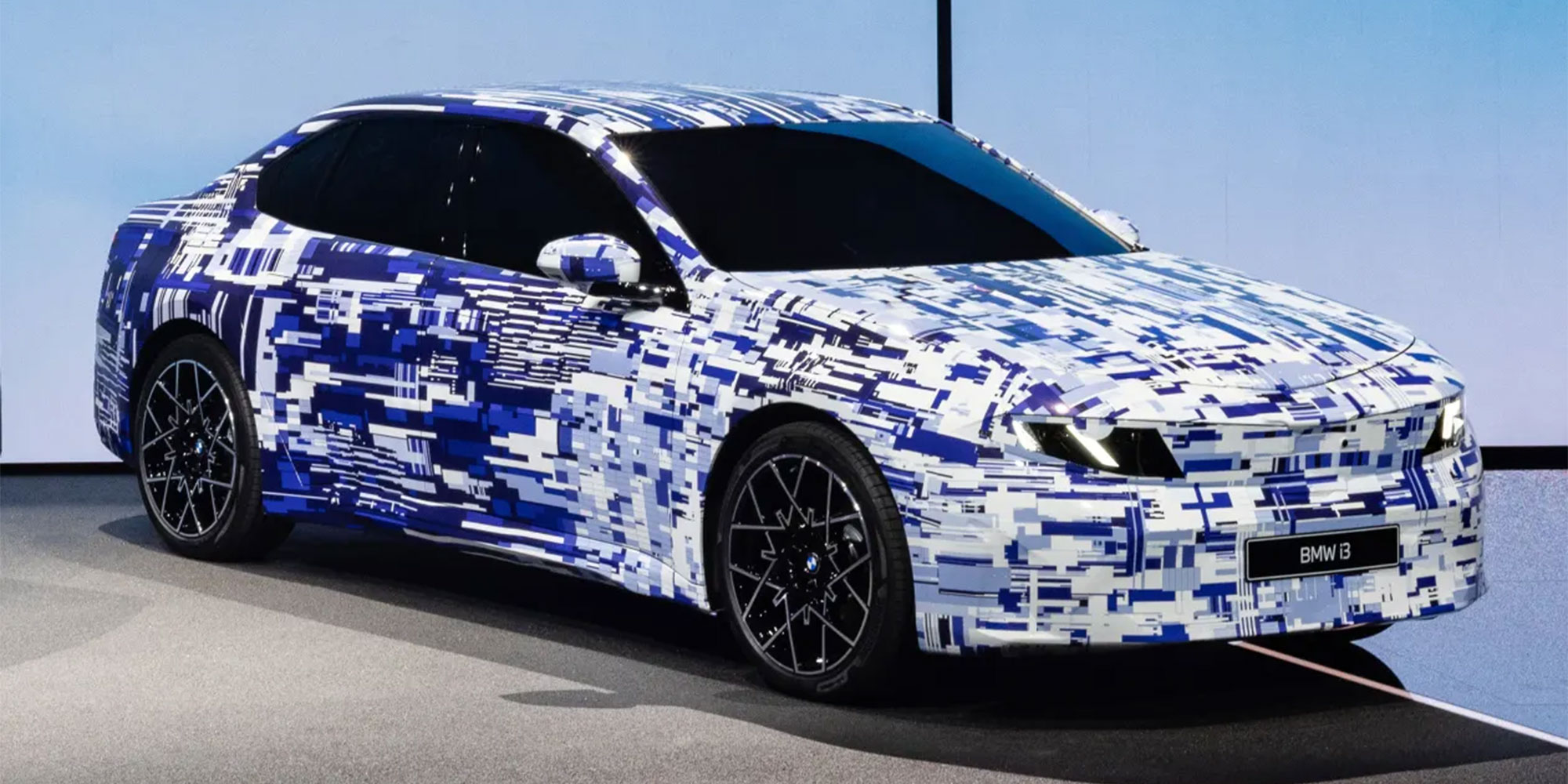 A camouflaged BMW i3 car 