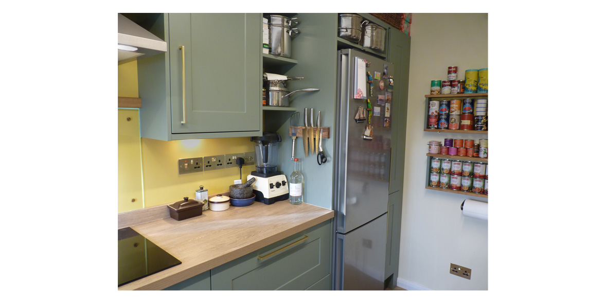 Green Howdens kitchen in a real home