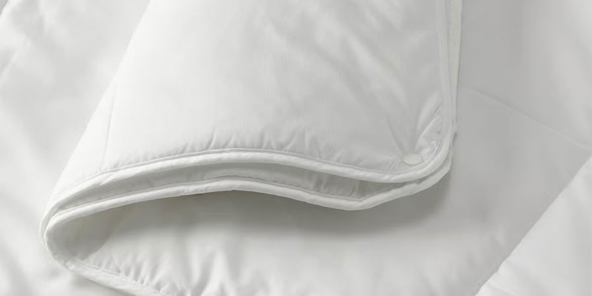 All-season duvet consisting of a lighter and heavier duvet that can be attached together