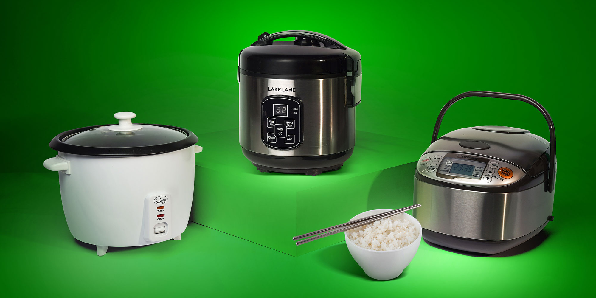 Three rice cookers with a bowl of rice