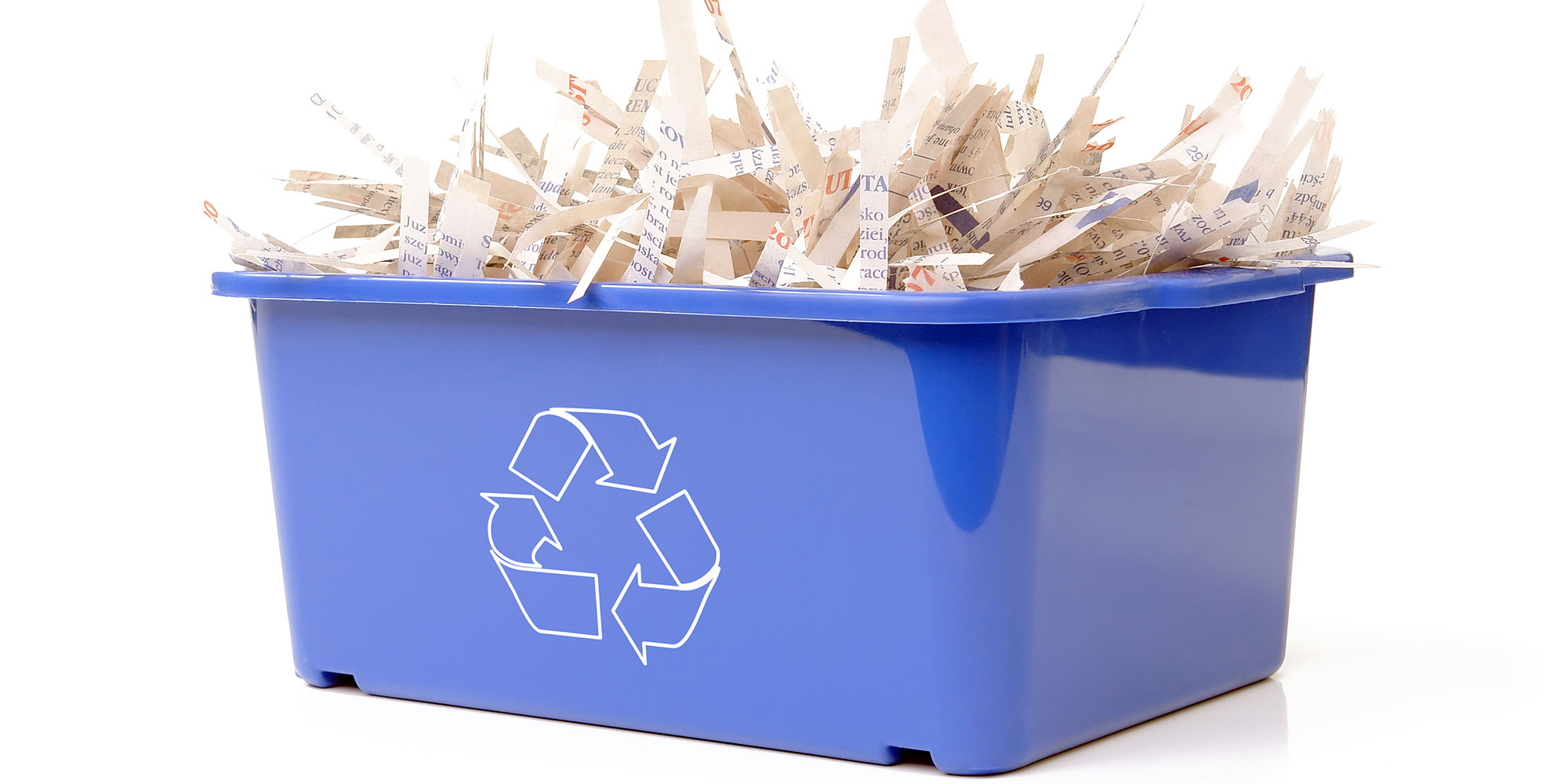 Recycling box full of shredded paper