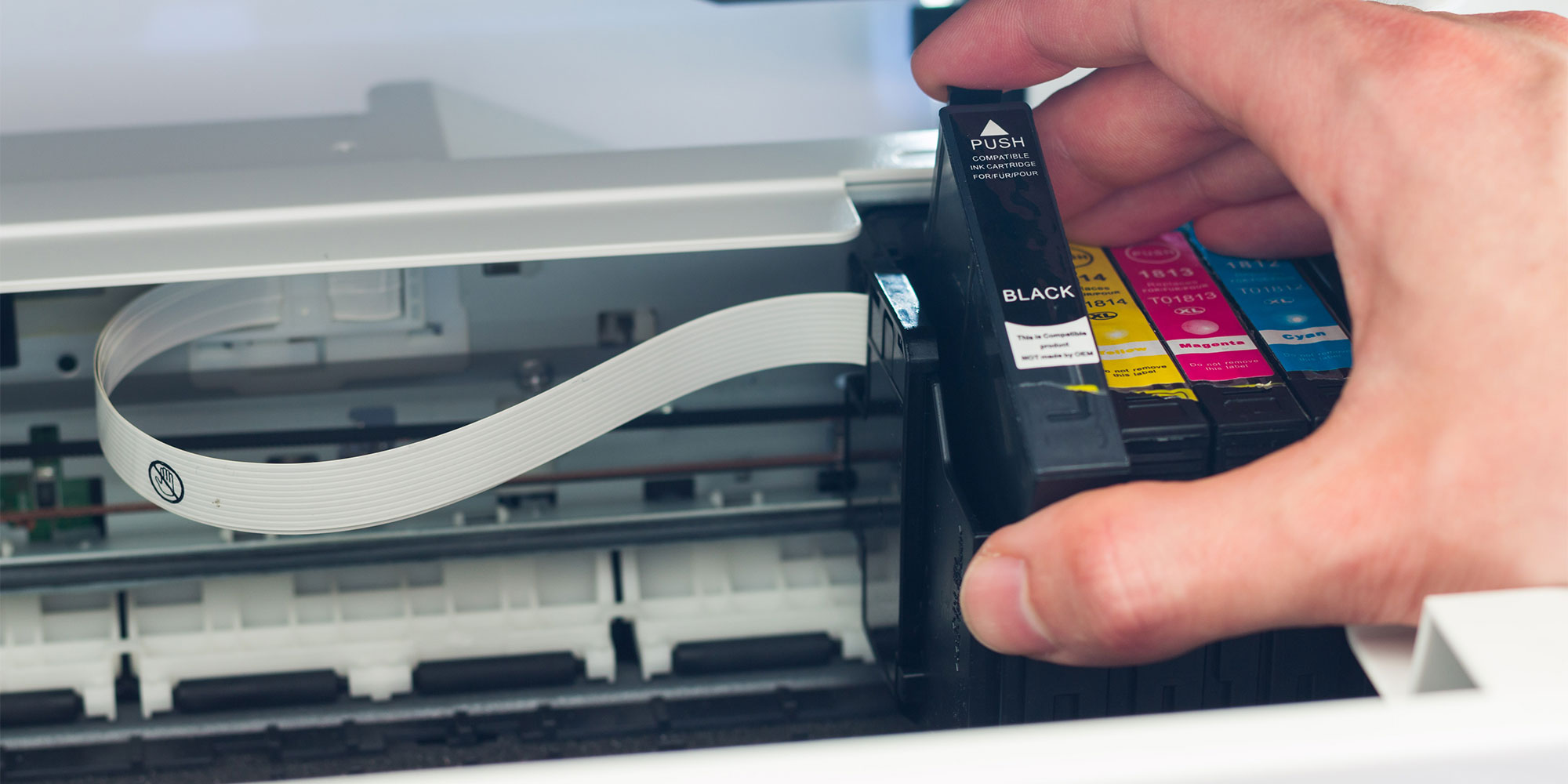 Brother printer with ink cartridges being inserted