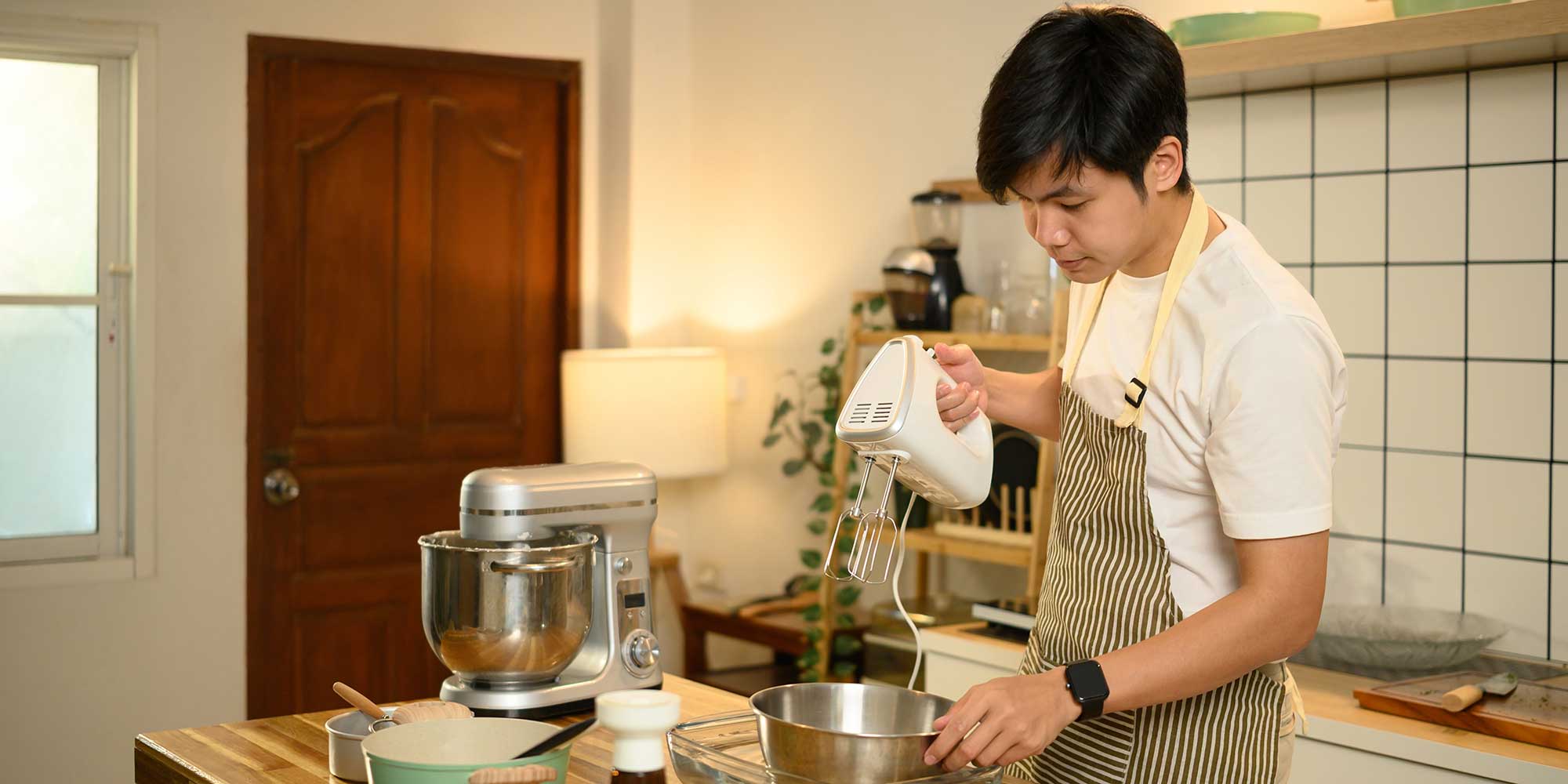 A hand mixer and a stand mixer