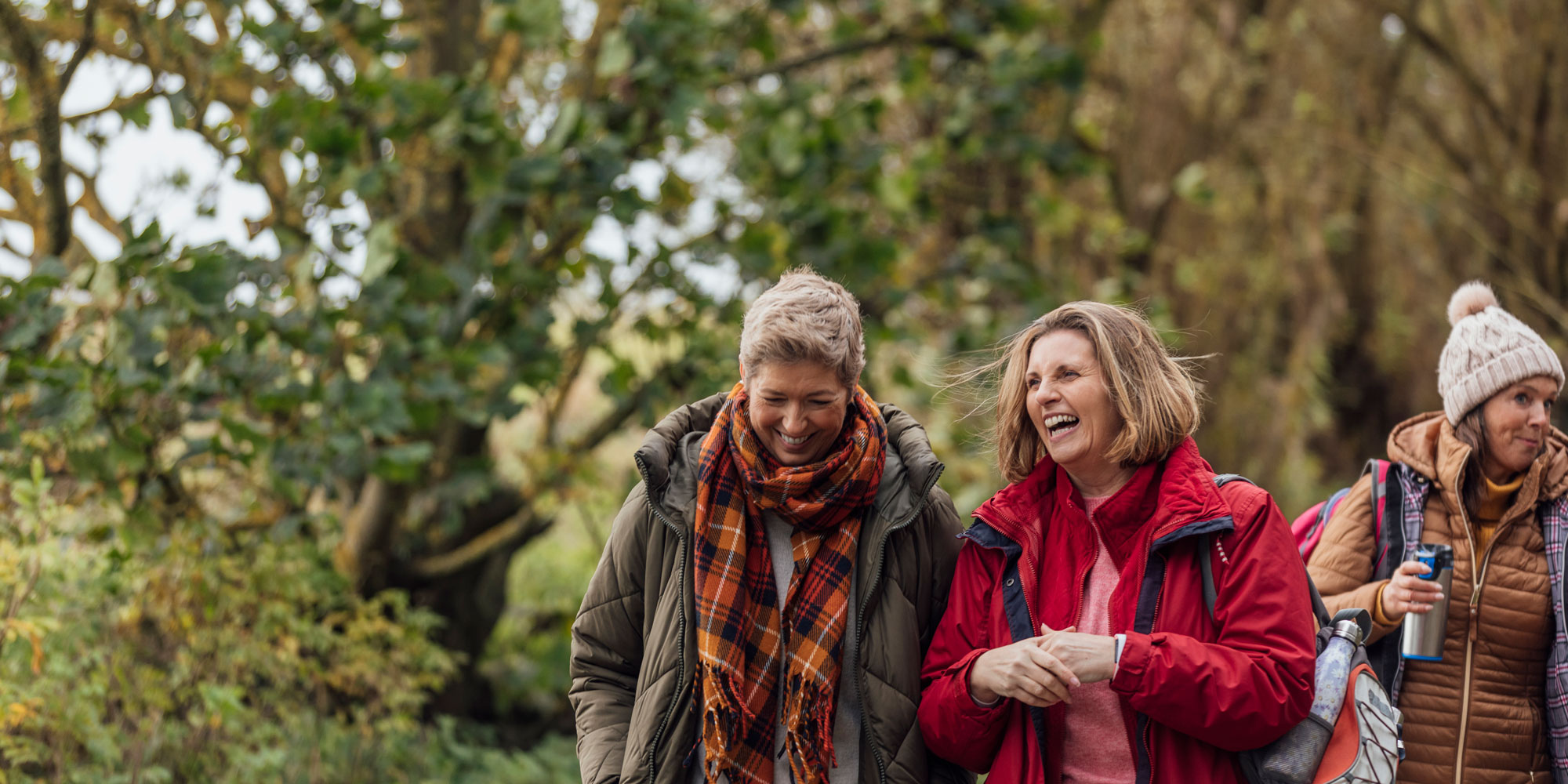 people laughing and enjoying the autumn weather