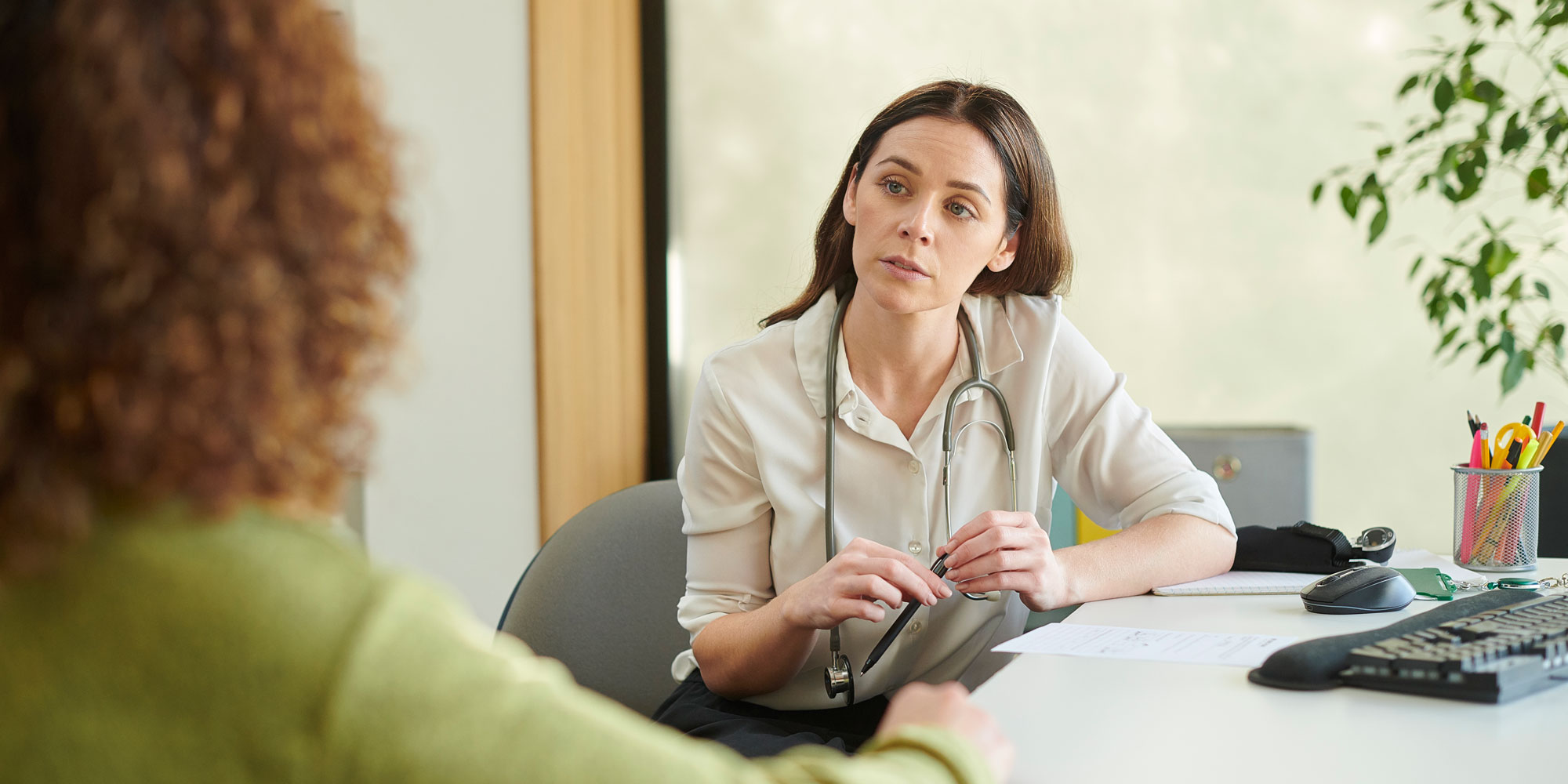 Woman talking with a GP