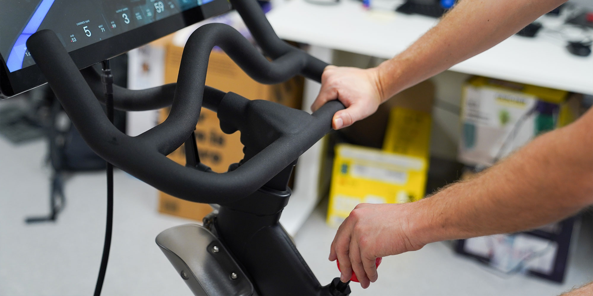 Adjusing Peloton bike