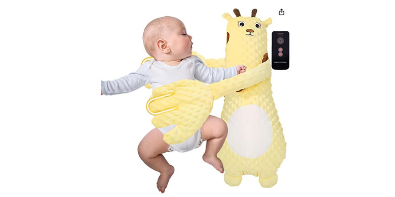 Baby sleeping next to a potentially unsafe sleeping pillow
