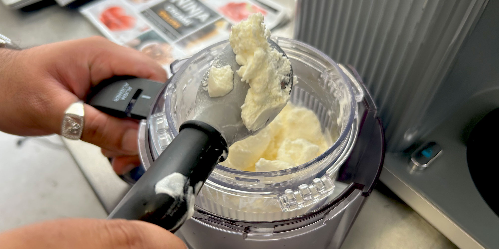 Pouring ice cream into a tub to be churned
