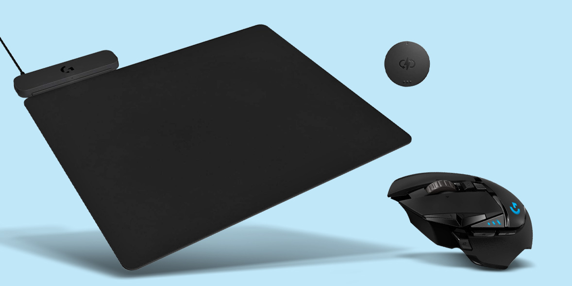 Logitech G502 mouse and charging pad