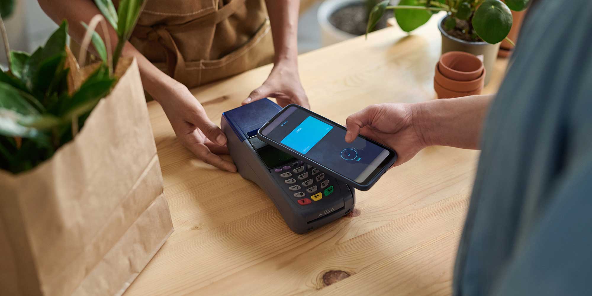 Consumer paying in store with a digital wallet