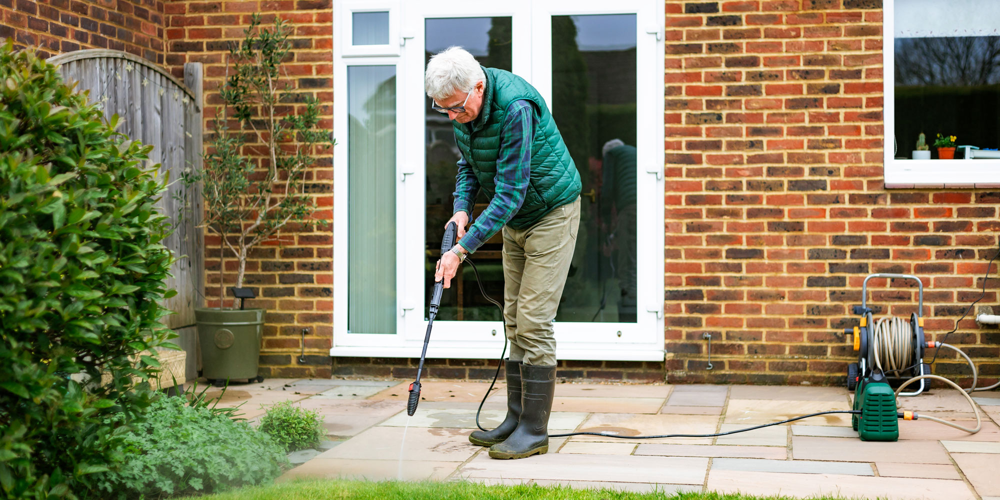 Man using a pressure washer