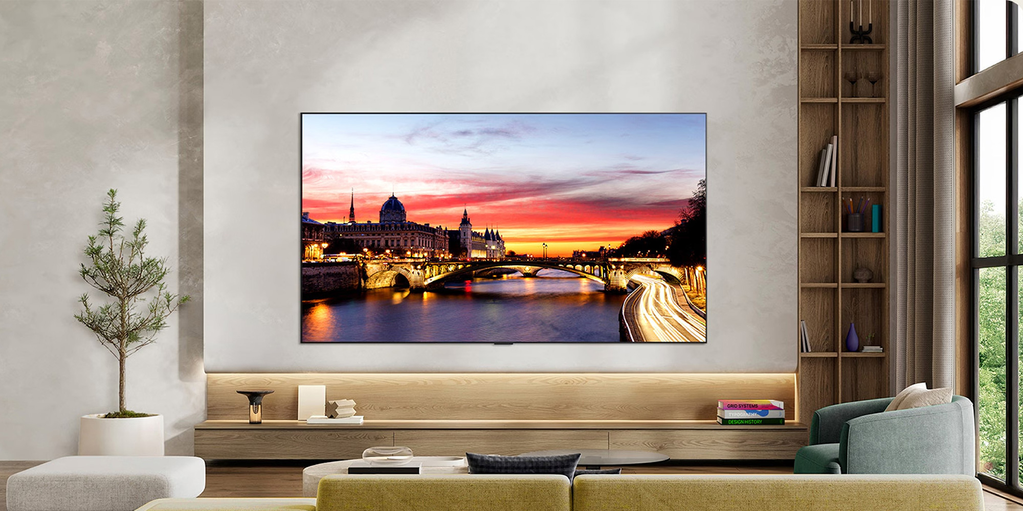 High-end LG OLED65C6ELB 4K TV mounted on a wall