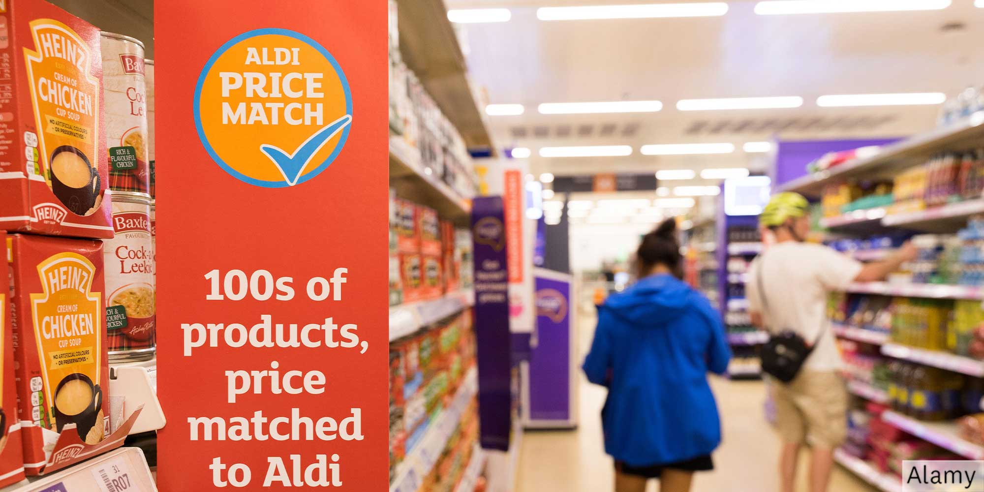 Aldi price match sign in a supermarket aisle