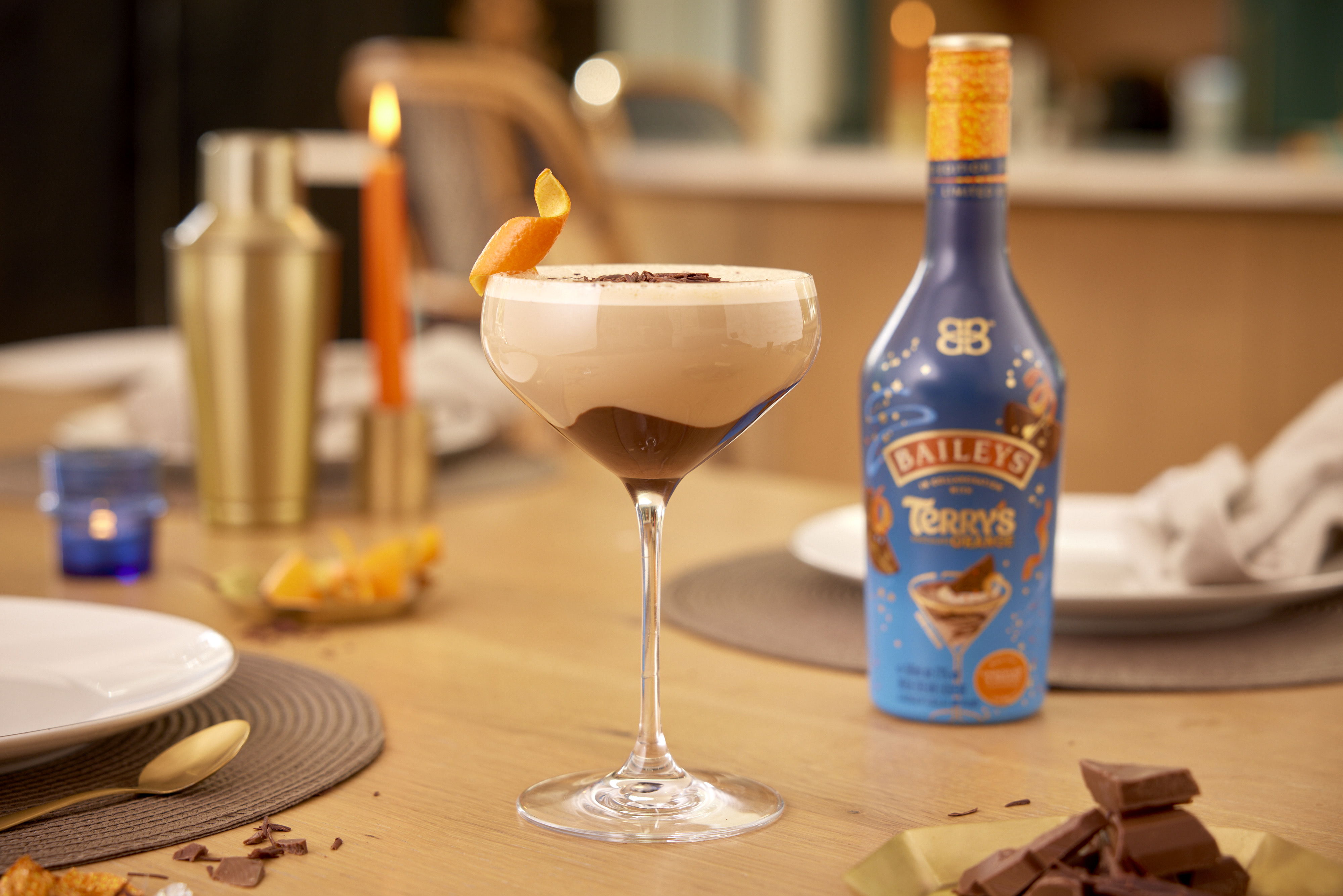 Baileys x Terrys collaboration chocolate orange martini cocktail in a martini glass on the table