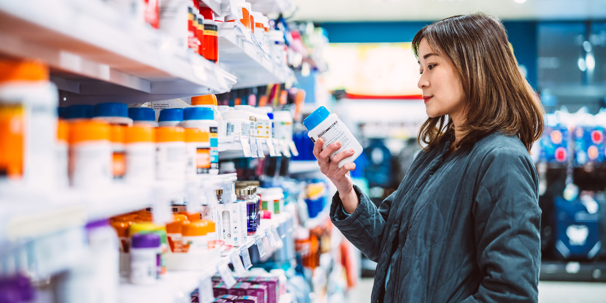 Woman choosing supplements