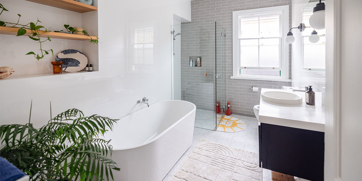 bathroom with bath, sink, shower enclosure