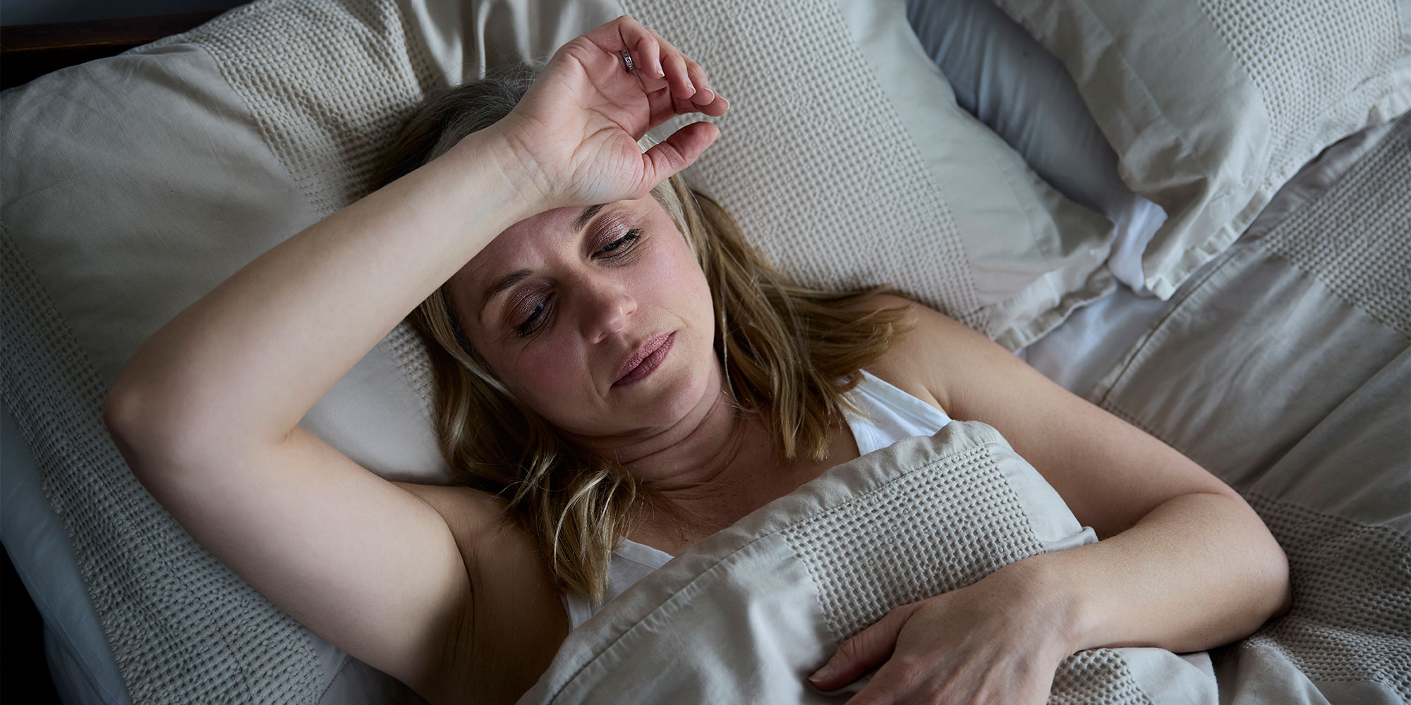 menopausal woman having a bad nights sleep