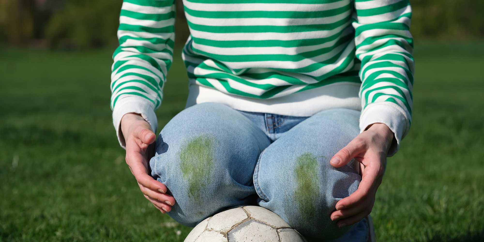 Jeans with grass stains on knees