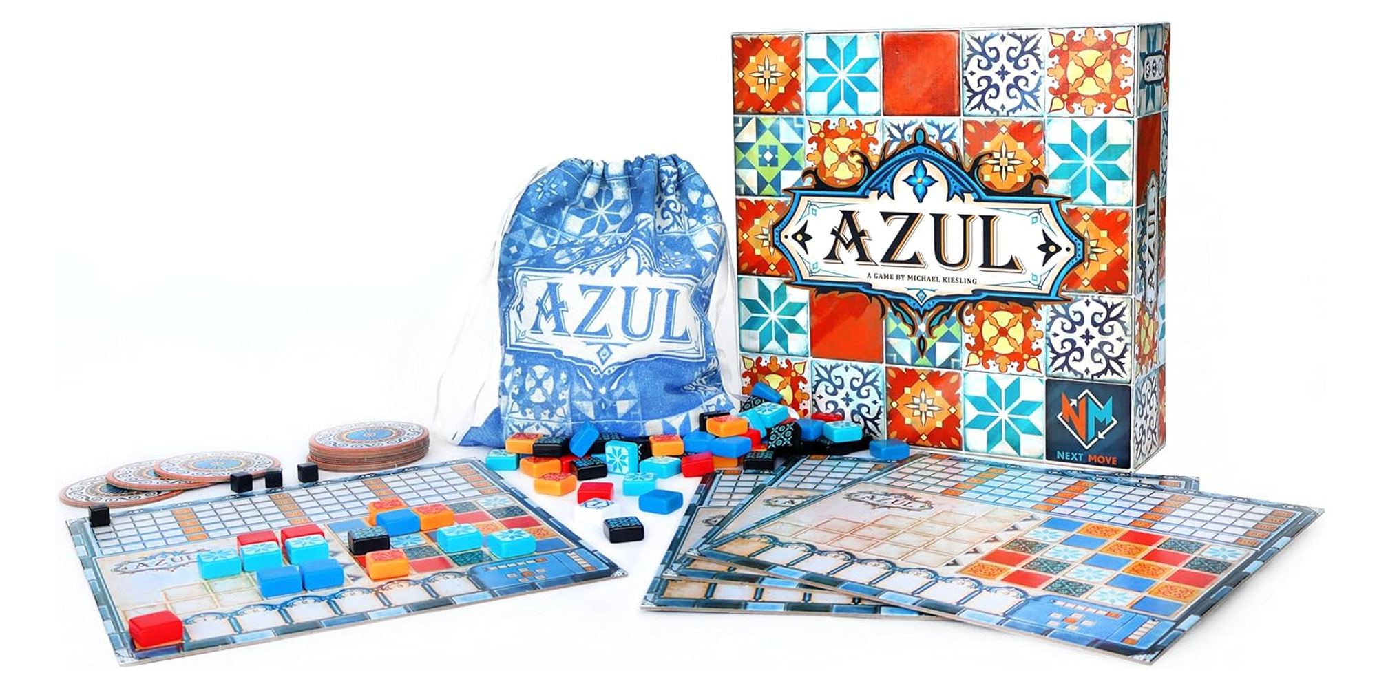 Azul board game displayed on table with game boards and coloured tiles.