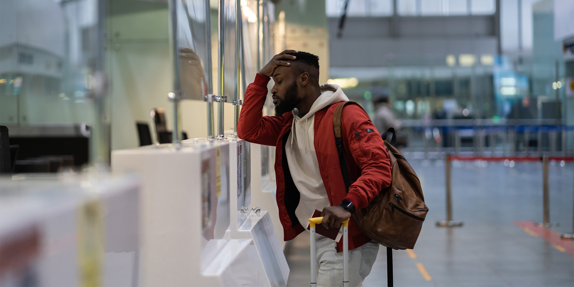 A man considers an offer to volunteer to give up his seat on a flight