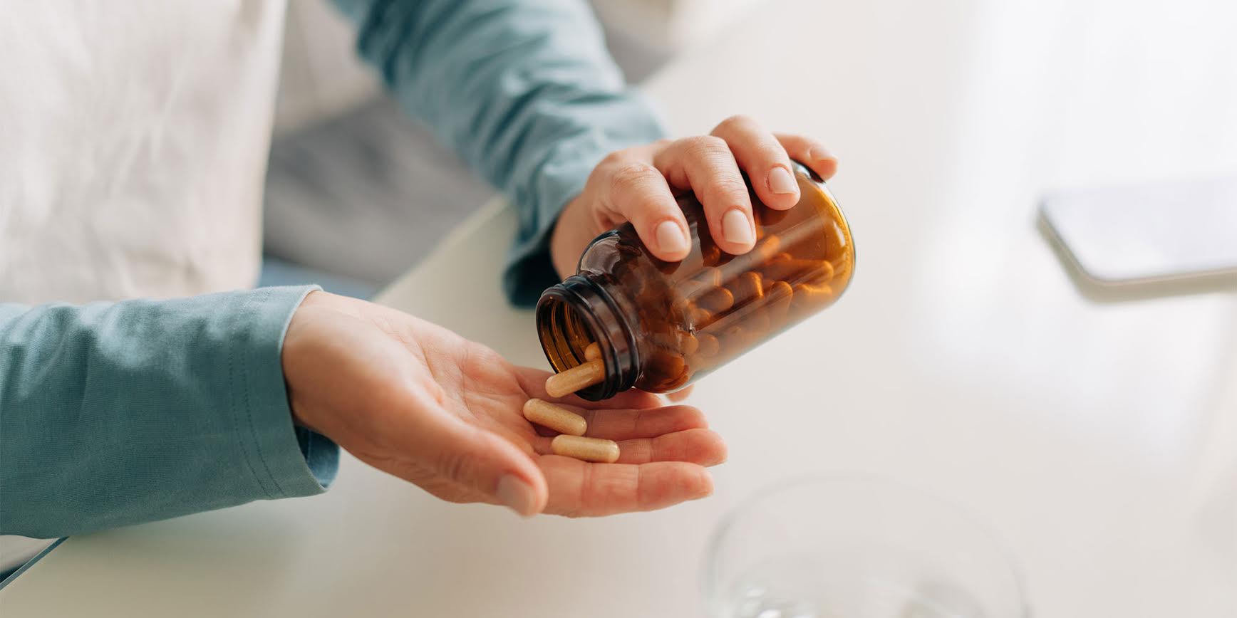 A person taking supplements