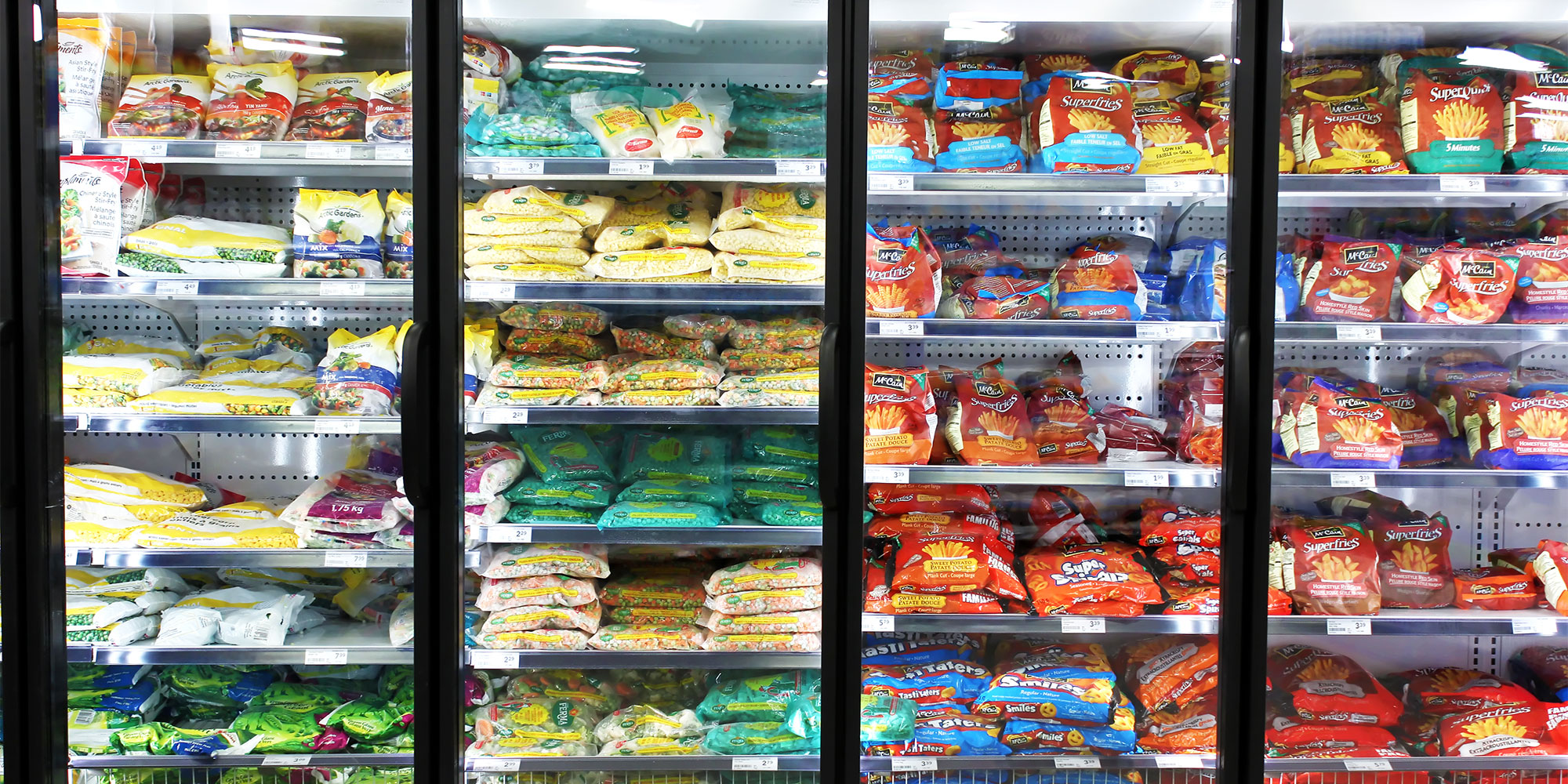 Frozen fruit and veg in the supermarket aisle 