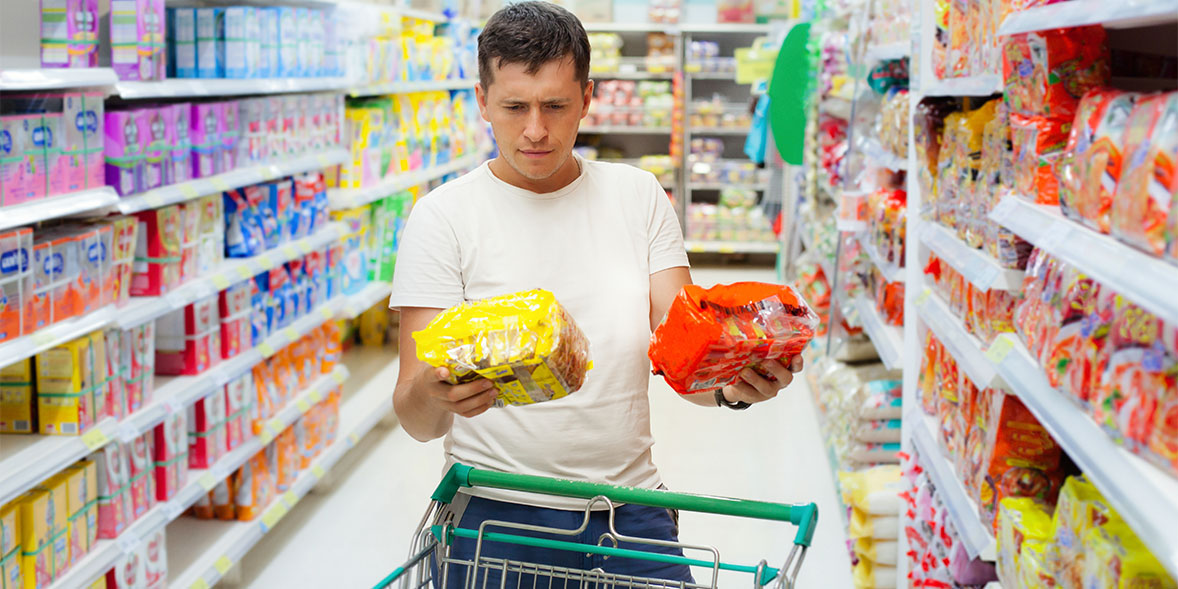 Consumer looking at prices in confusion