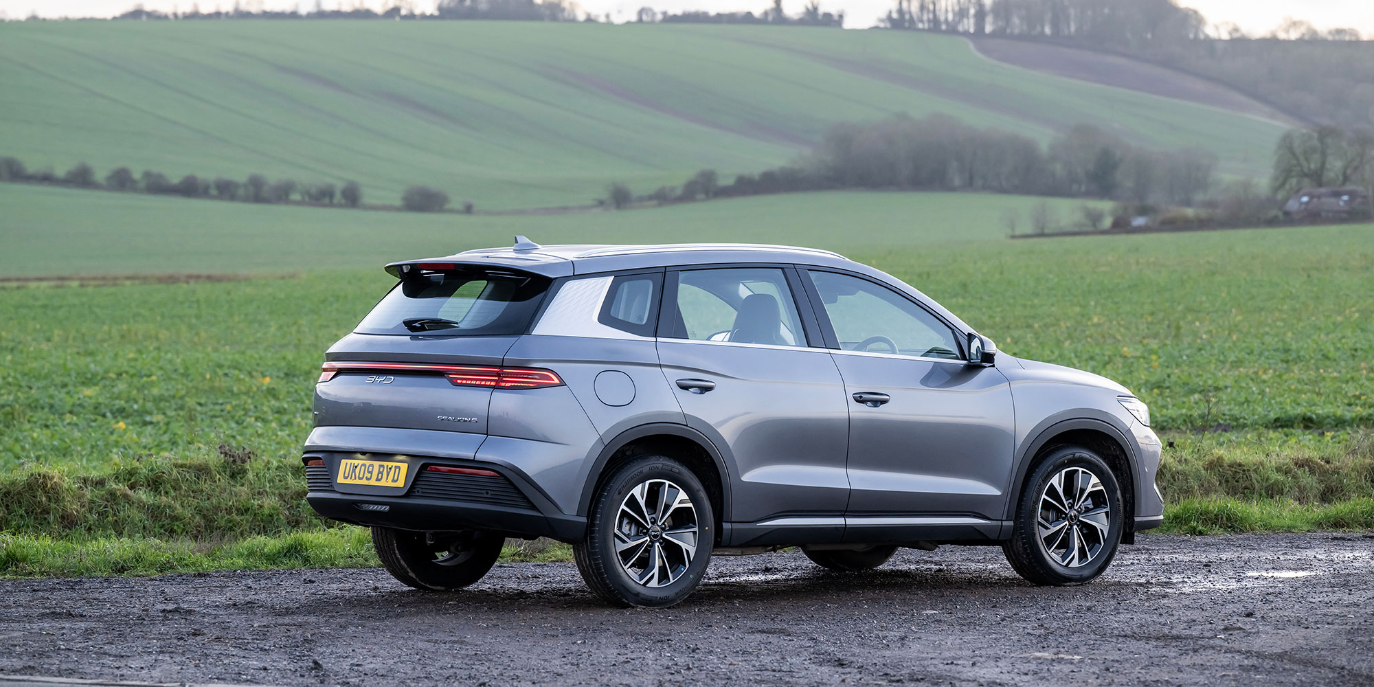 A rear three quarter image of the BYD Sealion 5 DM-i