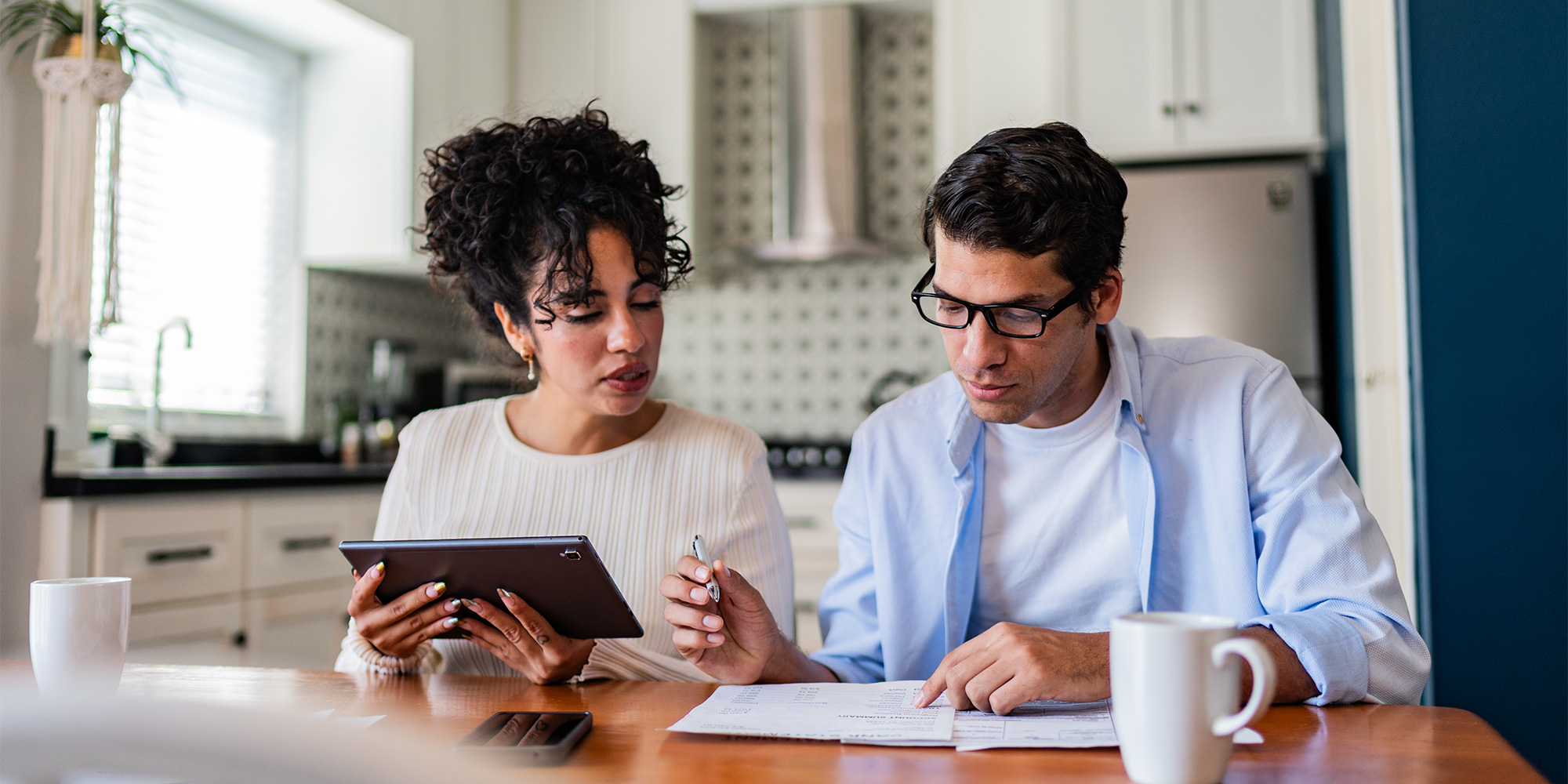Two people managing their finances