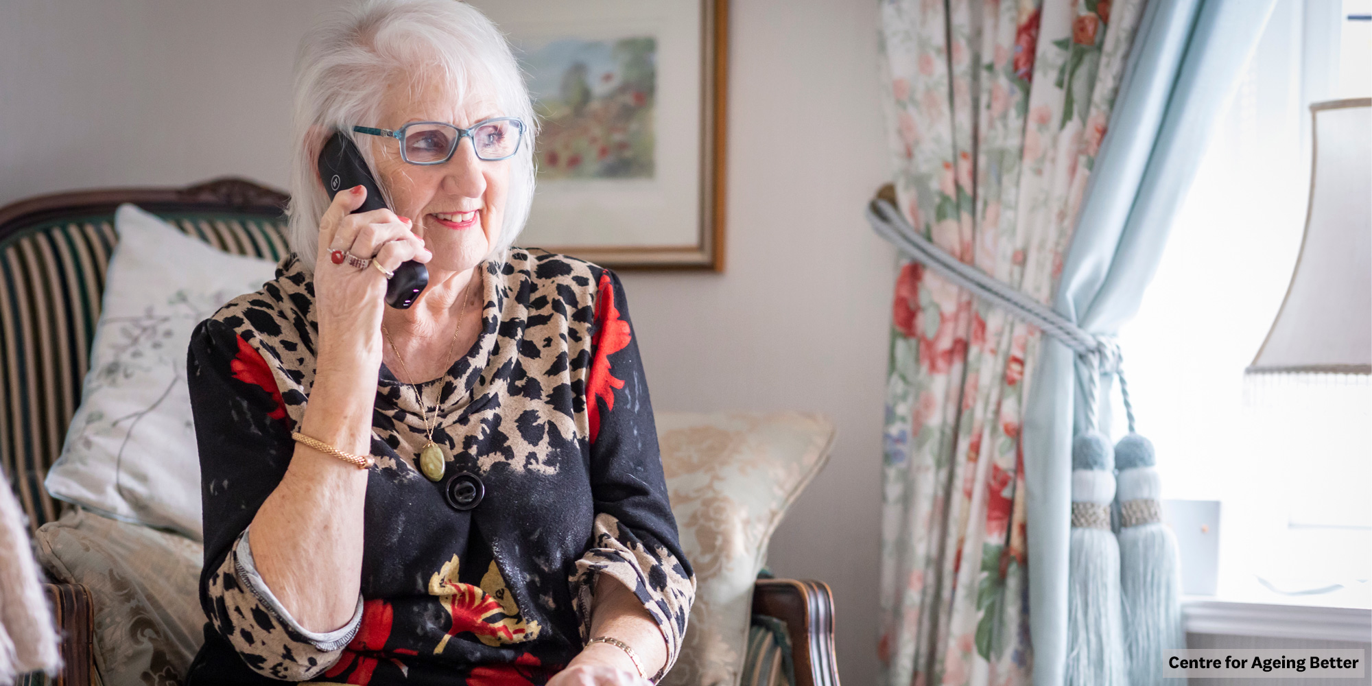 Woman using a landline phone