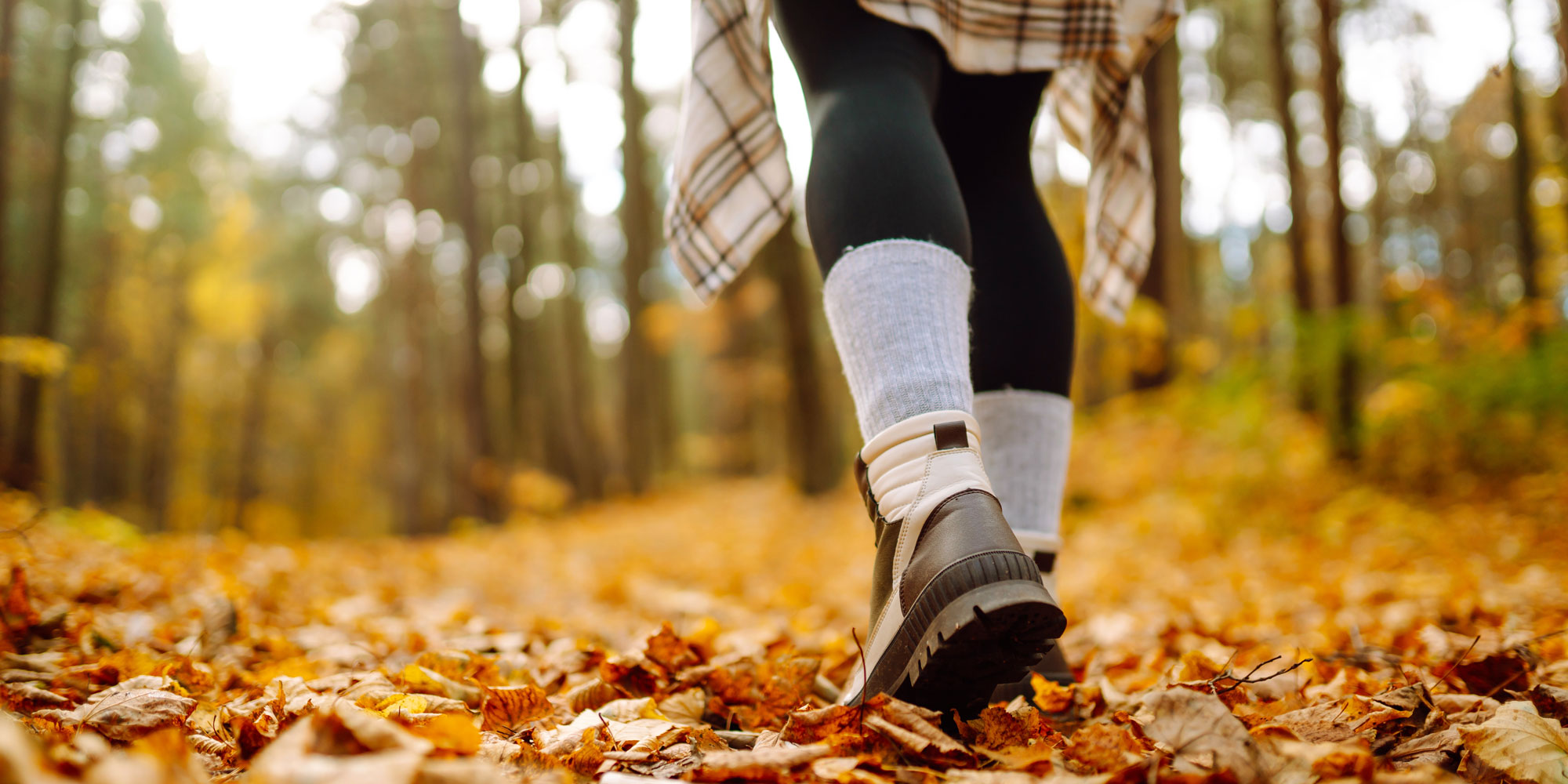 someone walking with a pair of woolly hiking socks