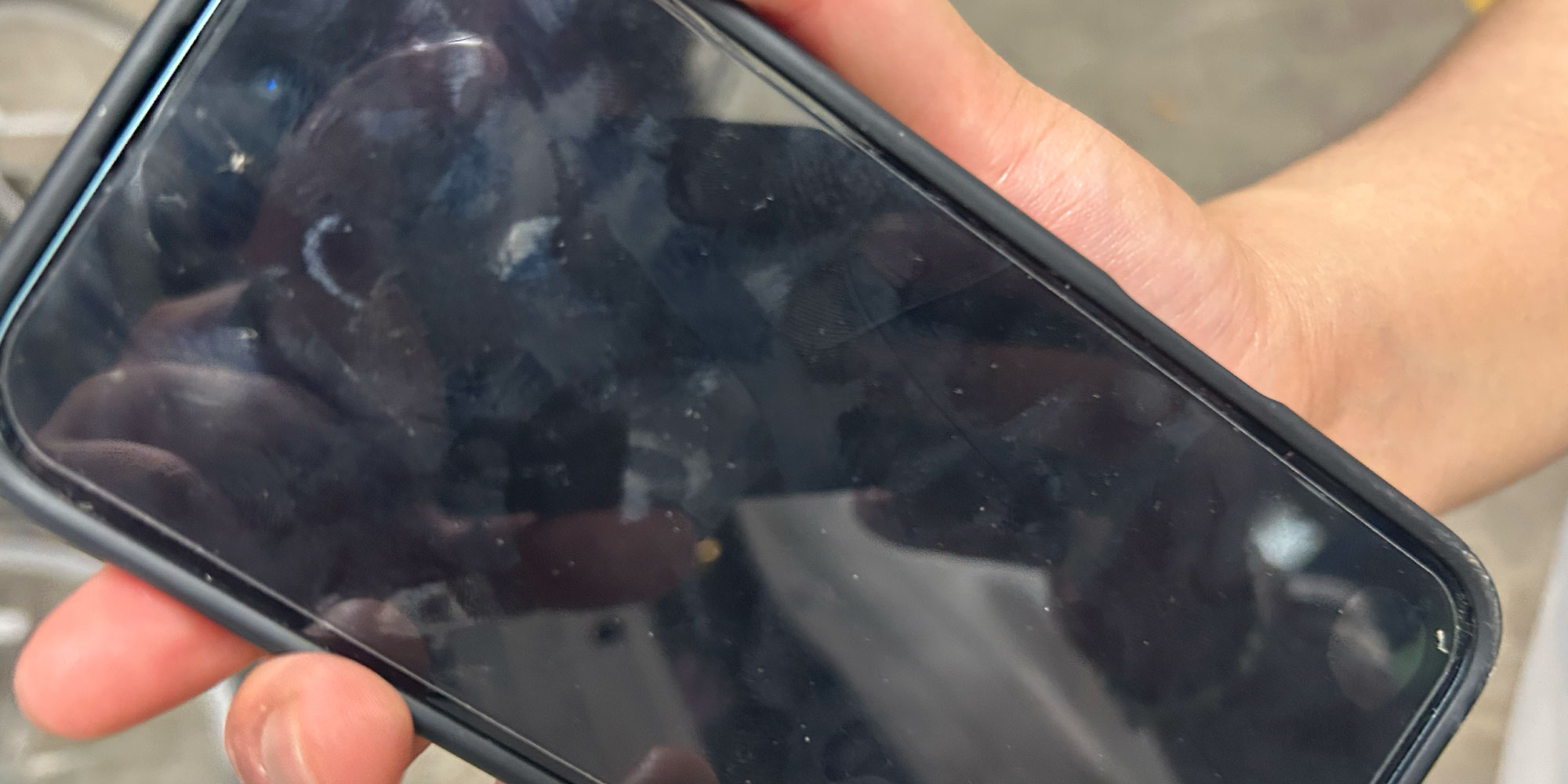 Phone case screen after being dropped on concrete