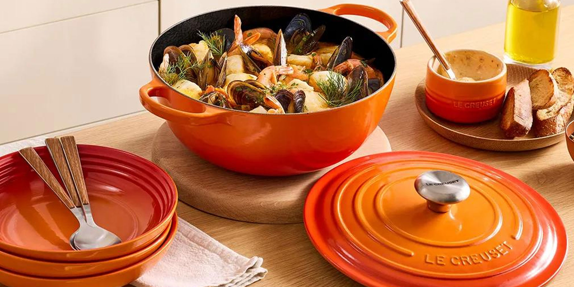 Le Creuset orange cook and tableware